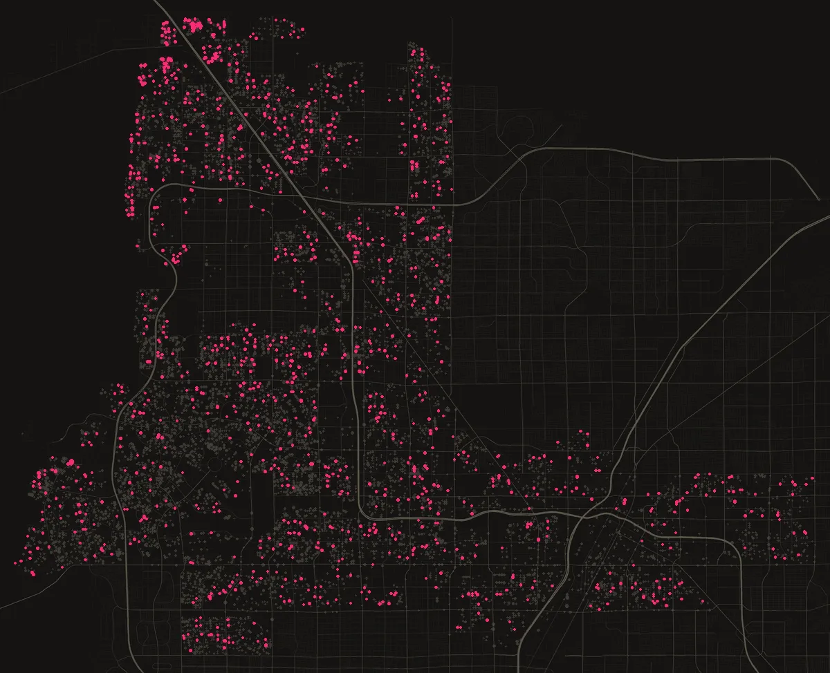 Map of the City of Las Vegas with 1,434 solar permits from the last twelve months, one dot per street block.