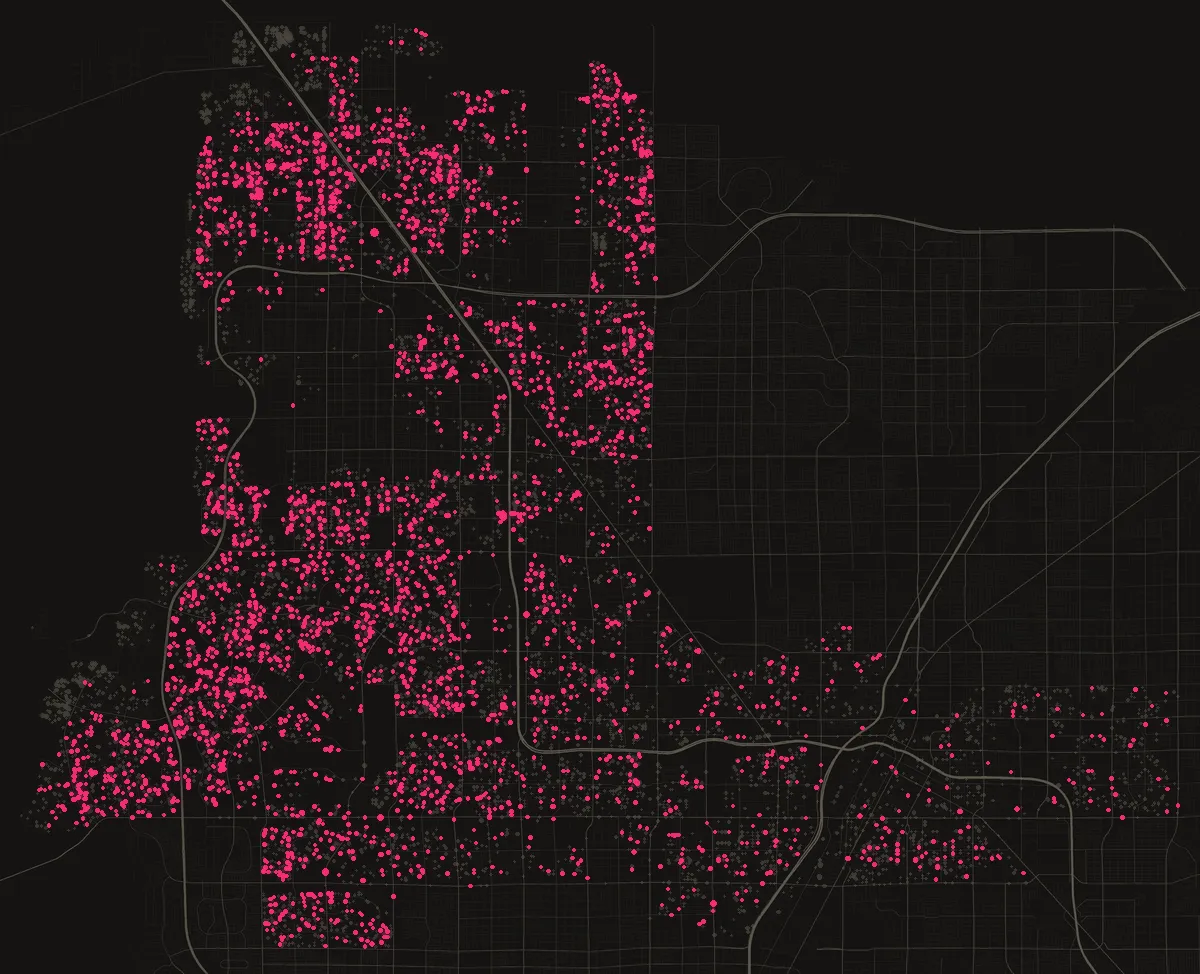 Map of the City of Las Vegas with 3,614 water heater permits from the last twelve months, one dot per street block.