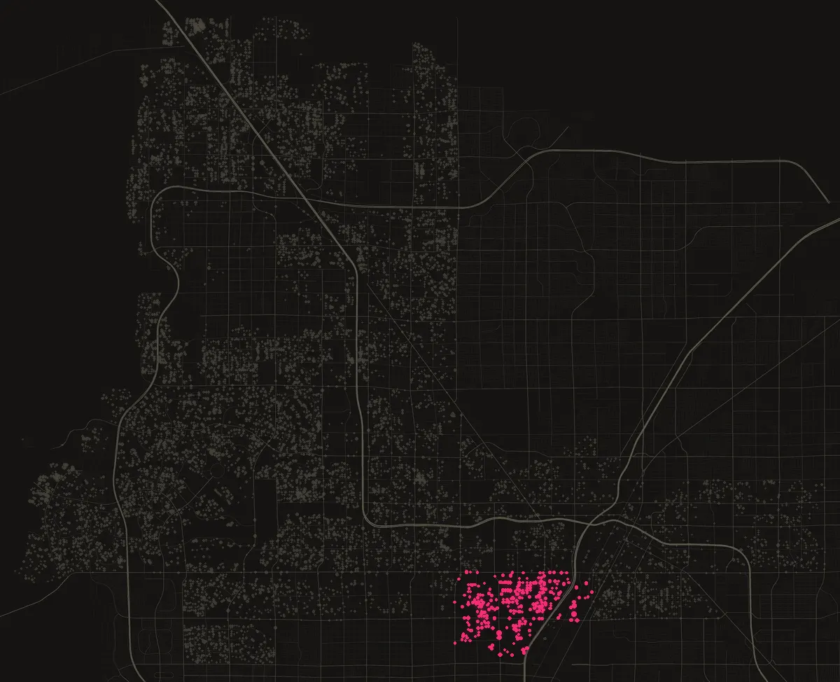 Map of the City of Las Vegas with permits in 89102 marked in pink, one dot per street block.