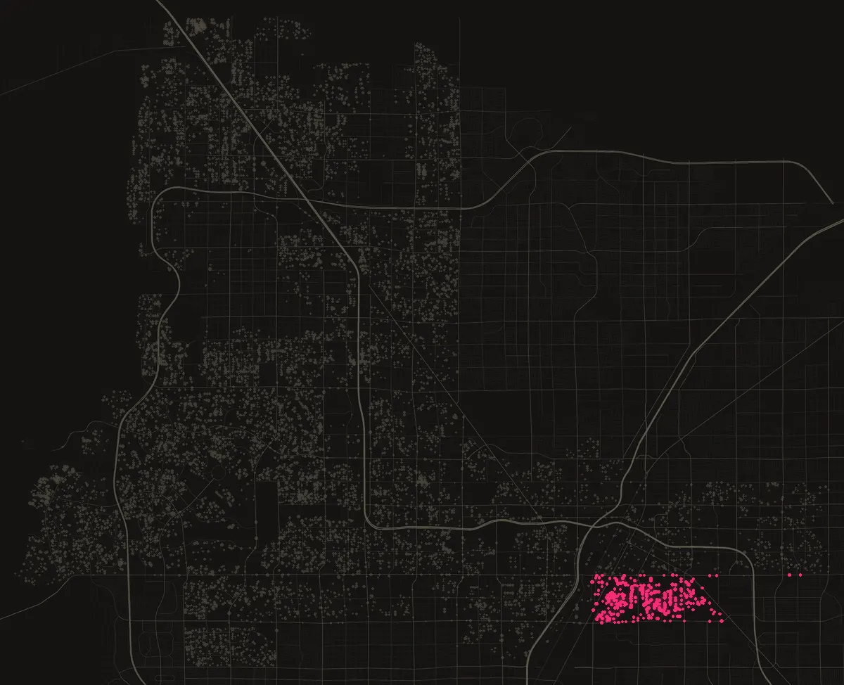 Map of the City of Las Vegas with permits in 89104 marked in pink, one dot per street block.