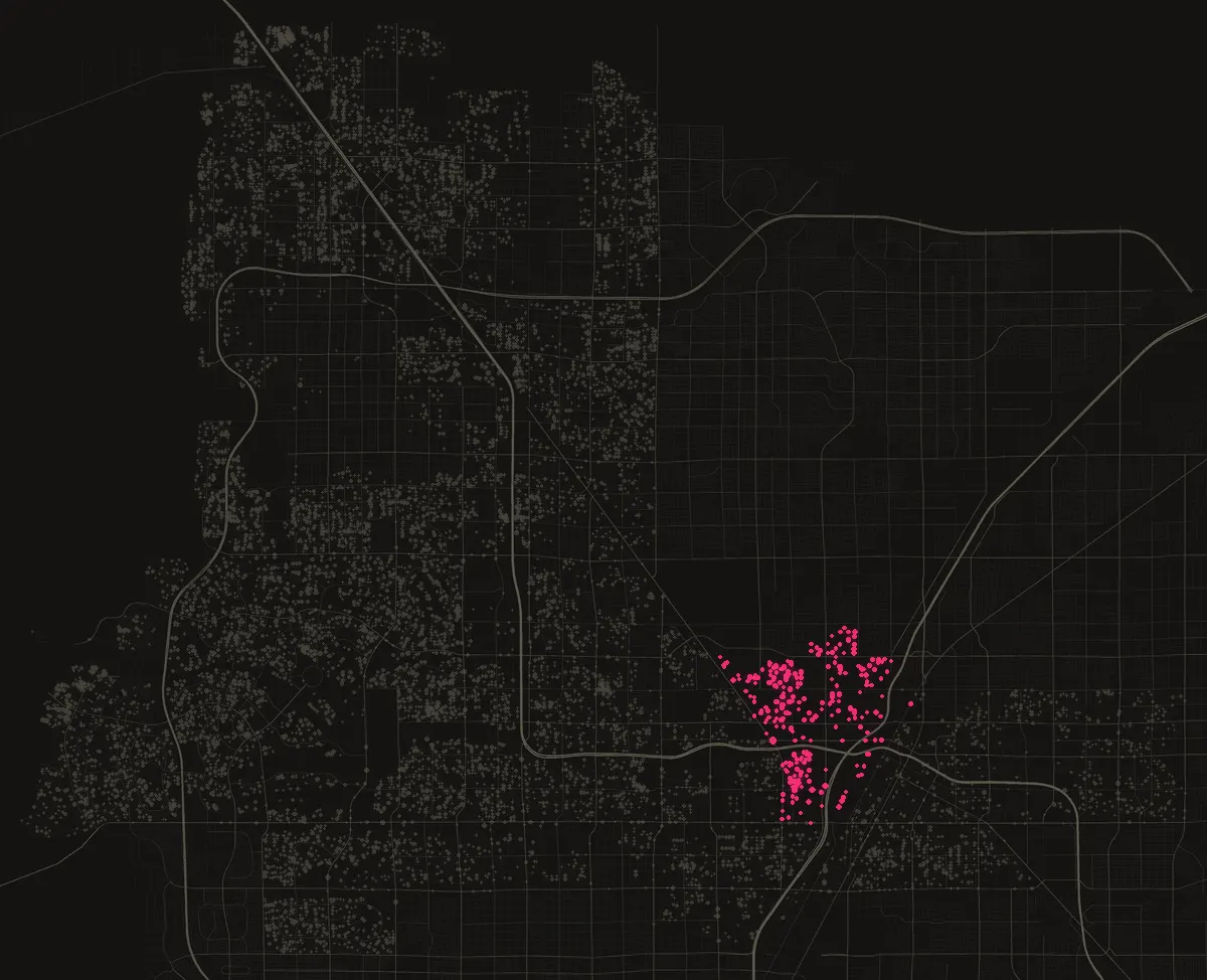 Map of the City of Las Vegas with permits in 89106 marked in pink, one dot per street block.