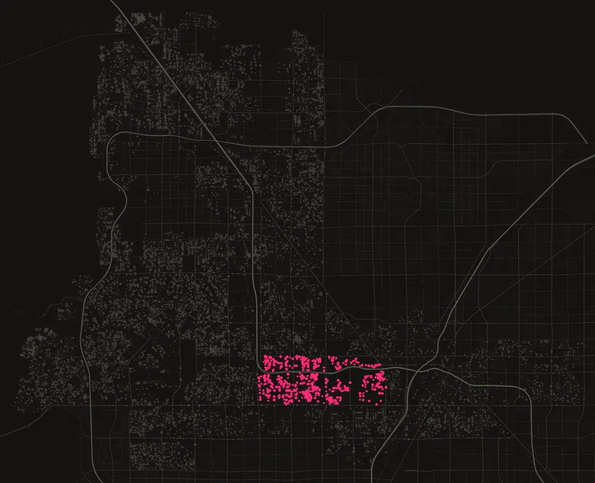Map of the City of Las Vegas with permits in 89107 marked in pink, one dot per street block.