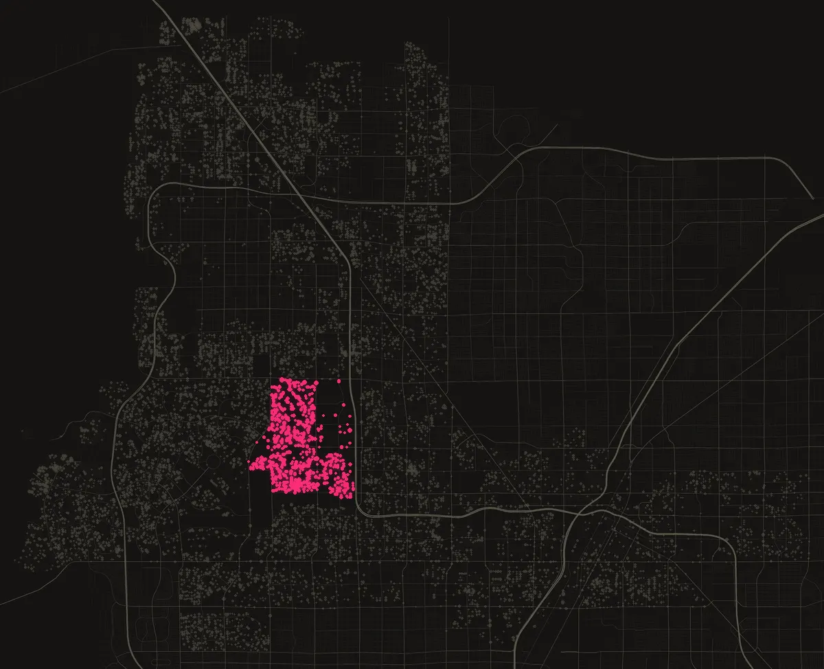 Map of the City of Las Vegas with permits in 89128 marked in pink, one dot per street block.