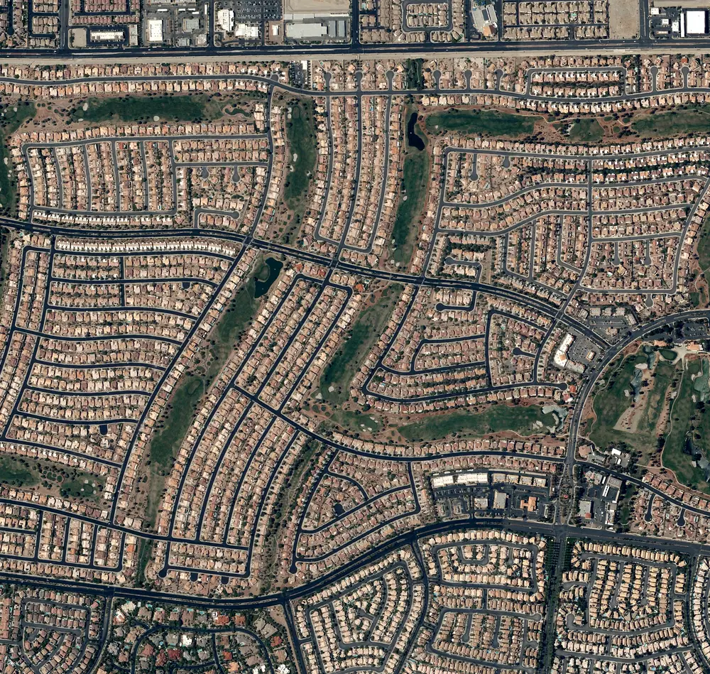 Aerial photo of one square mile of Sun City Summerlin in the City of Las Vegas, with twelve street blocks marked in pink where the last AC permit is from 2008 to 2013.